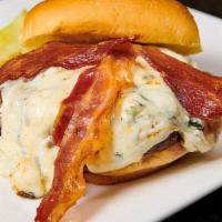 Rockwells Gorgonzola Burger · Served with gorgonzola cheese and bacon. Served with a pickle spear and choice of side.