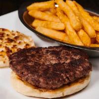 Burger · On an English muffin served with French fries.