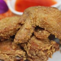 Thai Crispy Wings(6) · Six pieces. Deep fried chicken wings with sweet chili sauce.