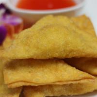 Crab Rangoon(6) · Six pieces. Crabmeat mixed with cream cheese and herbs, wrapped with fried wonton. Served wi...