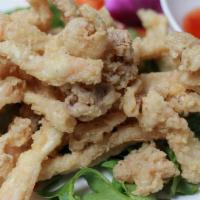 Thai Crispy Calamari · Deep fried breaded squid served with sweet chili sauce.