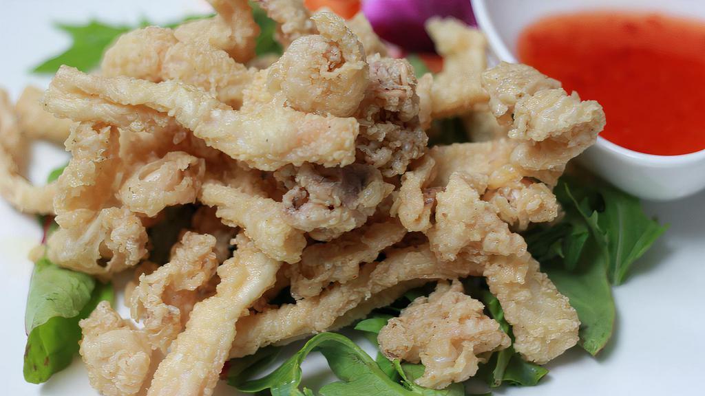 Thai Crispy Calamari · Deep fried breaded squid served with sweet chili sauce.