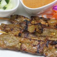 Beef Satay(4) · Four pieces. Beef grilled on skewers served with peanut sauce and cucumber.