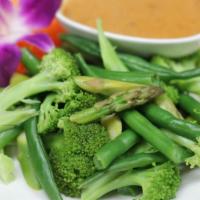 Steamed Mixed Greens · Steamed broccoli, string beans, and asparagus with peanut sauce on the side.