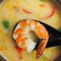 Coconut Milk Tom Kar Soup · Spicy coconut soup with bell peppers, onions, and mushroom. Spicy lowest level mild.