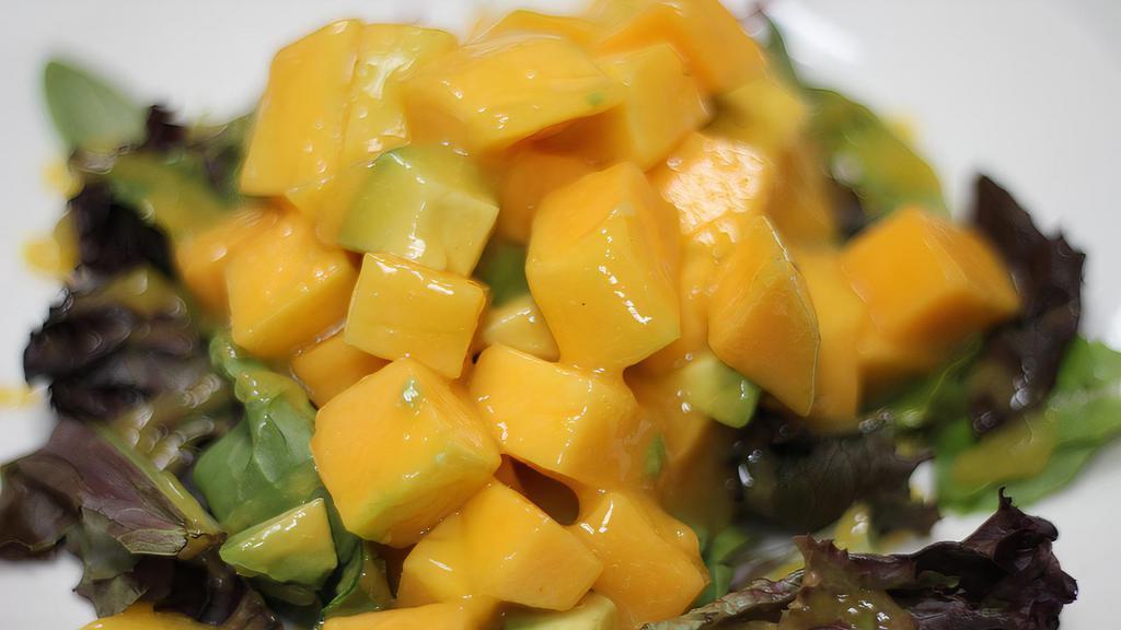 Mango Salad · Mixed greens, avocado, and mango with sweet mango dressing.