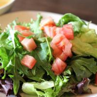 Garden Salad · Mixed greens with ginger citrus dressing.