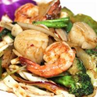 Thai Basil Seafood · Spicy. Jumbo scallops, shrimp, squid sauteed with onions, scallions, bell peppers, broccoli,...