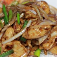 Mongolian Chicken · Spicy. Sauteed chicken with onions and scallions over a bed of crispy noodles. Served with s...