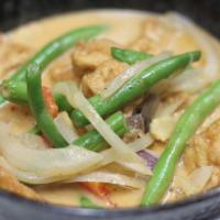 Panang Curry · A rich, thick, red curry cooked with coconut milk, basil, string beans, and bell pepper. Ser...