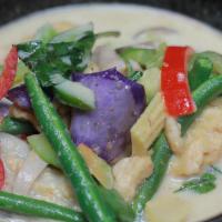 Green Curry · Green curry with basil, eggplant, string beans, bell pepper, and coconut milk. Served with s...