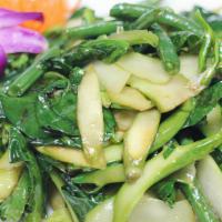 Ever Green · Sauteed with Chinese broccoli, string beans, and asparagus in brown sauce. Served with steam...
