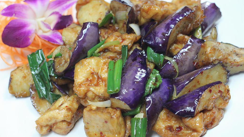 Eggplant & Tofu · Eggplant, tofu, and scallion stir fried in spicy basil sauce. Served with steamed jasmine rice. Spicy.