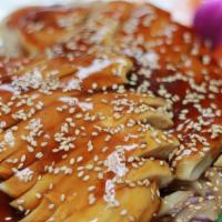Teriyaki Chicken · Grilled with teriyaki sauce. Served with seasonal vegetable and sesame seed and steamed jasm...
