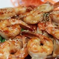 Teriyaki Shrimp · Grilled with teriyaki sauce, served with vegetables and sesame seeds. Includes steamed jasmi...