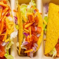 Tacos · Vegan. All tacos include lettuce, tomatoes, onions, vegan cheese & taco sauce with your choi...