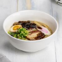 Tonkatsu Ramen With Black Garlic Oil · Pork ramen, chashu (roasted pork belly), kikurage, eggs, green onion, menma (bamboo) with Bl...
