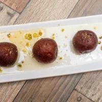 Mawa Gulab Jamun · Thick and juicy milk balls served with a thick syrup.