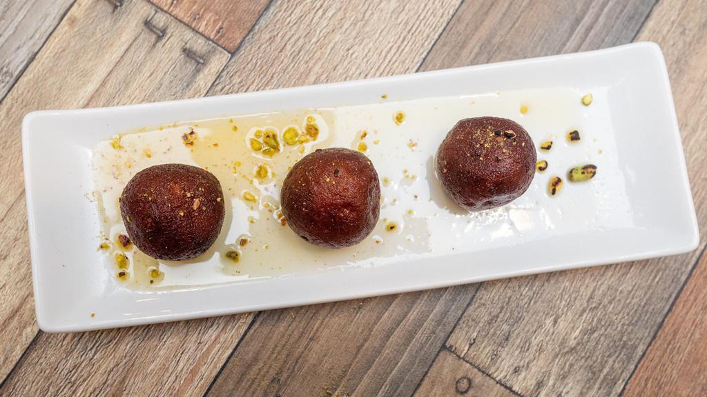 Mawa Gulab Jamun · Thick and juicy milk balls served with a thick syrup.
