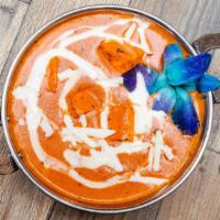 Paneer Makhani · A popular Punjabi dish made with paneer, tomatoes, cashews, spices, and cream.