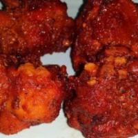 Drums Of Heaven Dry · Chicken lollipop sautéed with our chef's special spicy sauce.