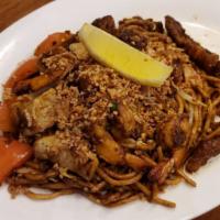 Indian Mee Goreng · Hot & Spicy. Indian style stir-fried egg noodle with shrimp sprinkled with grounded peanut a...