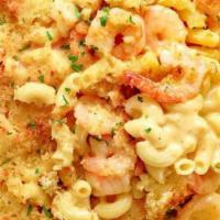 Shrimp Mac · The ultimate soul food, this classic shrimp mac is made with delicious melted cheese, the pe...