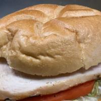 Grilled Chicken Breast Sandwich · All natural chicken breast grilled and served with lettuce and tomato.