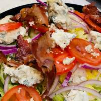 Wedge Salad · Bacon, tomato, blue cheese.