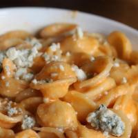Buffalo Mac & Cheese · Our signature mac served with our house made buffalo style hot sauce.