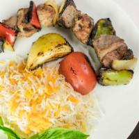 Lamb Shish Kebab · Sufiya's Grill favorite: Gluten free. Flavorful cubes of leg of lamb marinated in house spec...