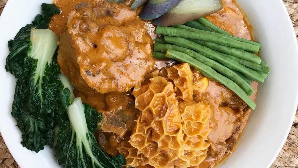 Kare Kare · Large only. Oxtail, tripe, peanut soup, Asian vegetables kare kare with rice (oxtail and tripe).