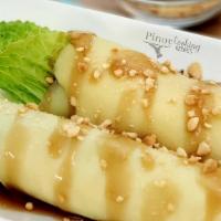 Lumpiang Sariwa · Mixed Vegetable Crepe. topped with peanut sauce (2 pcs)
