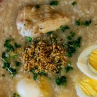 Arroz Caldo · Hot porridge, chicken, ginger, scallion and crispy garlic