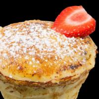 Crepe Brûlée · Strawberry, brulee cream, crunchy flakes, caramelized sugar topping. Gluten-free.