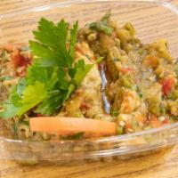 Eggplant Salad · Smoked eggplant mixed with mashed garlic and roasted and pepper.
