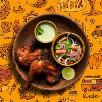 Tandoori Chicken Holy Moly · Bone-in chicken marinated in yogurt and house spices cooked to perfection in an Indian clay ...