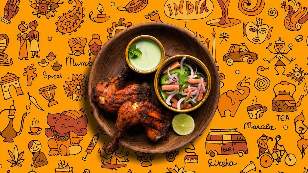 Tandoori Chicken Holy Moly · Bone-in chicken marinated in yogurt and house spices cooked to perfection in an Indian clay oven