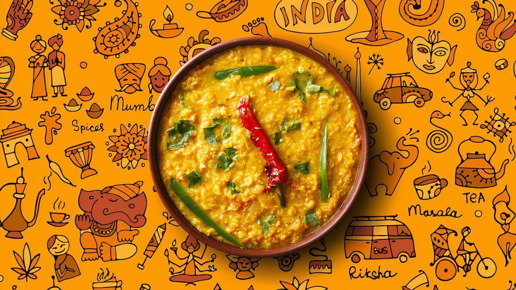  Daal Bright Lights · Yellow lentils, cooked to perfection over a slow flame and tempered with 'ghee' and spices, served with a side of our aromatic basmati rice