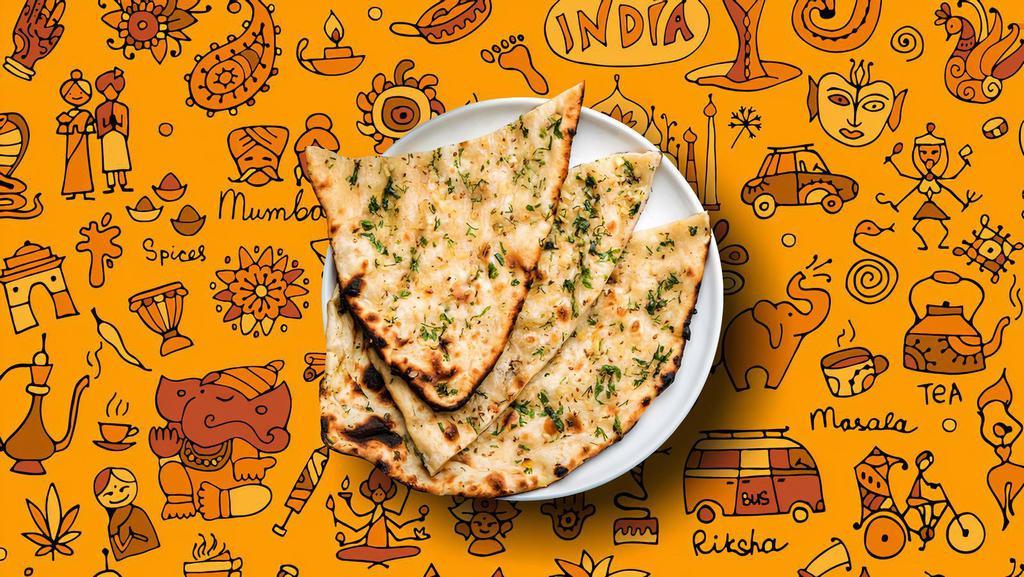 Garlic Garlic Naan · House made pulled and leavened dough loaded with fine chopped garlic and baked to perfection in an Indian clay oven