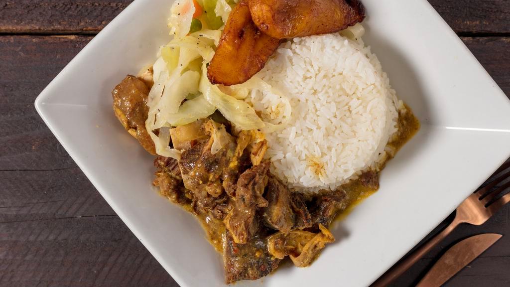 Larege Curried Goat · Goat meat cut into small pieces, well seasoned and cooked with aromatic spices and herbs

Please specify which rice (rice & peas, pumpkin rice or white rice) you would like with your goat meat.