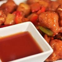 Jamaican Style Sweet & Sour Chicken · Finger licking chicken mixed in with homemade sweet and sour sauce
