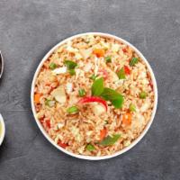 Boomer Basil Fried Rice · Fried rice with egg, fresh chili, onions, bell peppers, tomato, and basil.