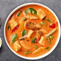 Red Flag Curry · Coconut milk, green beans, bamboo shoots, bell peppers, and basil with red curry paste. Serv...