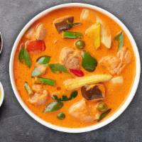 Mango Wango Curry · Mango, tomato, onion, and bell pepper with red curry paste, topped with mango sauce. Served ...