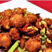 Diced Crispy Chicken With Crispy Red Pepper 香脆椒炒鸡丁 · With white rice.