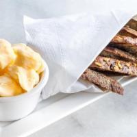 Wisconsin Cheese Curds · The squeakiest curds around served with warm sliced bread