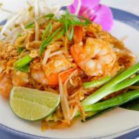 Pad Thai · Rice noodles, beansprouts, scallions, red onion, bean curd, egg and peanuts. Gluten free.