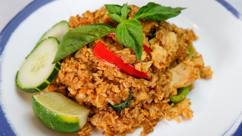 Spicy Basil Fried Rice · Thai basil leaves, fried egg, onion, bell pepper, and chili, . Mixed with rice. Spicy.
