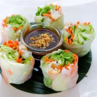 Thai Summer Roll · Fresh lettuces, cucumbers, carrots, mint, basil, vermicelli and fried tofu wrapped in soft r...